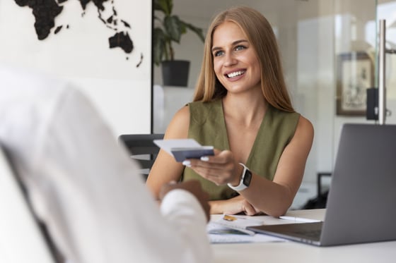 medium-shot-woman-working-travel-agency (1)